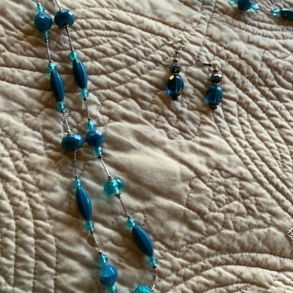 Blue clear drop earrings with a 30” blue bead necklace